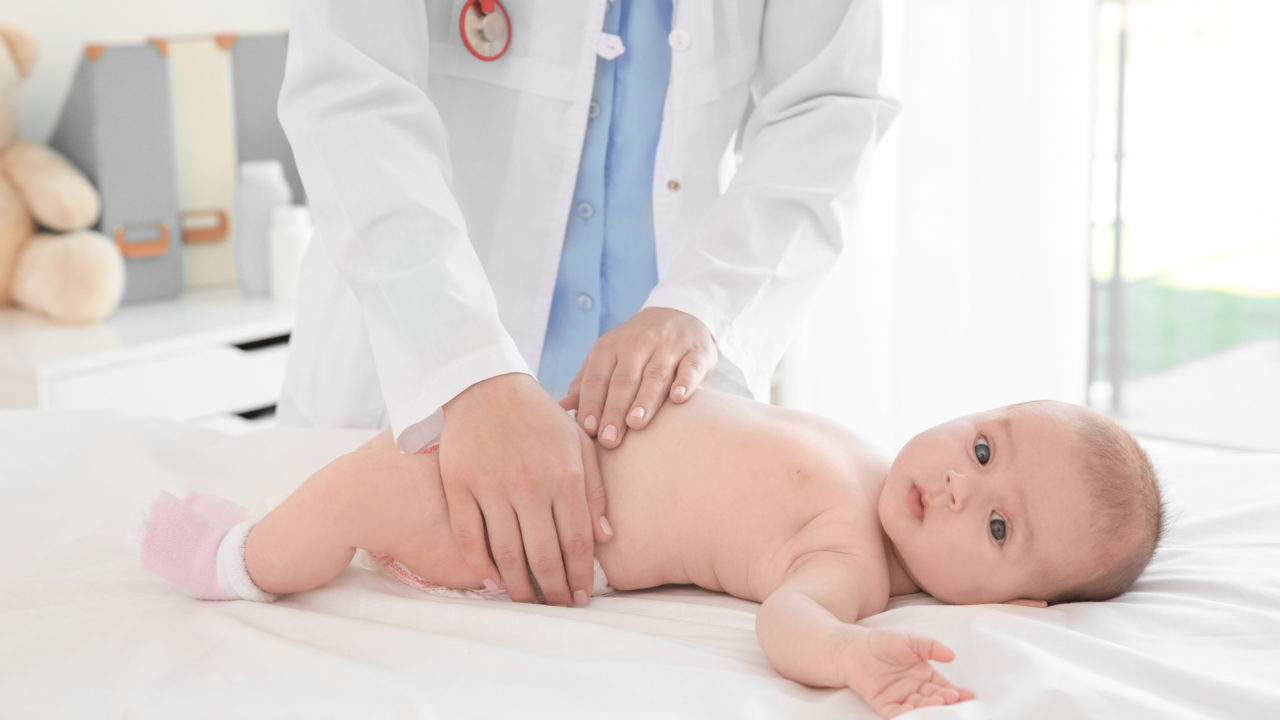 doctor examining baby article image